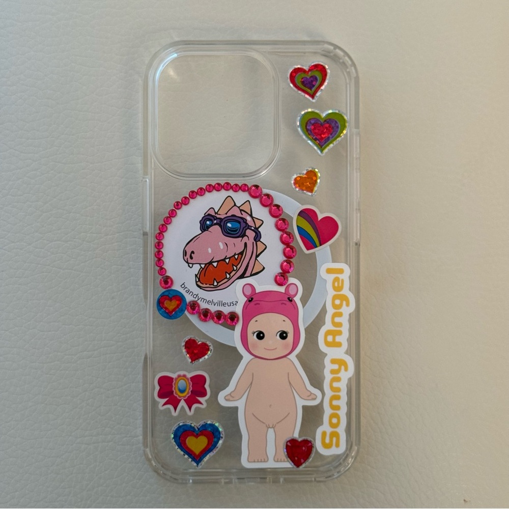 Clear iPhone 16 Case with Pink Character and Heart Stickers